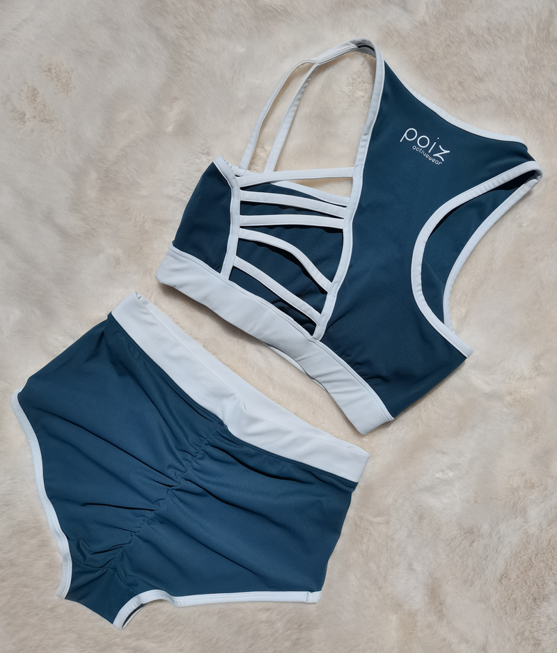 navy blue & white sports bra and  high-waisted shorts